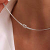 Dainty Silver Knot Necklace – A Timeless Symbol of Connection and Strength